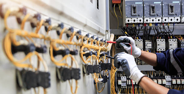Professional Electrician technician working in Ampere North, NJ